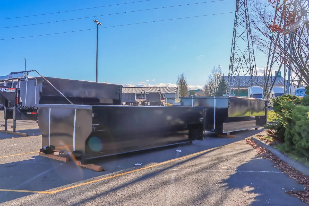 Roll-off dumpster ready for waste disposal at job site for 6 Yard Dumpster Rental in Clayton